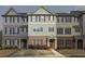 Attractive townhome with brick and siding facade, multiple windows and manicured lawn at 3920 High Dove Sw Way # 11, Smyrna, GA 30082