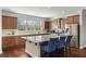 Well-equipped kitchen with a large island, stainless steel appliances, and ample cabinetry at 3920 High Dove Sw Way # 11, Smyrna, GA 30082