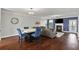 Open-concept living and dining area with hardwood floors and neutral color scheme at 3920 High Dove Sw Way # 11, Smyrna, GA 30082