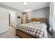 Bright bedroom with adjoining bathroom and a comfortable neutral color scheme at 4030 Gold Mill Rdg, Canton, GA 30114
