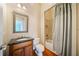 Bathroom with vanity, toilet and shower behind gray curtain at 4955 Ivy Ridge Se Dr # 404, Atlanta, GA 30339