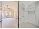 Light-filled bedroom with ceiling fan and large double doors at 4955 Ivy Ridge Se Dr # 404, Atlanta, GA 30339