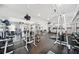 Community gym featuring modern equipment, rubber floors, and mounted televisions at 4955 Ivy Ridge Se Dr # 404, Atlanta, GA 30339