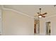 The main bedroom features elegant trim and a ceiling fan at 4955 Ivy Ridge Se Dr # 404, Atlanta, GA 30339