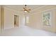 The main bedroom is carpeted and features two large windows at 4955 Ivy Ridge Se Dr # 404, Atlanta, GA 30339