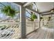 View from cozy balcony with decorative railings, ferns, and a wooden floor at 708 Mcgill Ne Pl, Atlanta, GA 30312