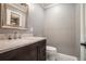 Bathroom features a dark wood vanity and stainless steel faucet at 708 Mcgill Ne Pl, Atlanta, GA 30312