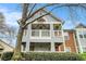 Charming two-story condo with dual balconies, featuring a mix of siding and brick at 708 Mcgill Ne Pl, Atlanta, GA 30312