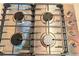 Close-up of a stainless steel gas cooktop featuring four burners at 2414 West Rd, Riverdale, GA 30296
