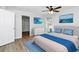 Stylishly furnished bedroom with cool blue accents and bright natural light at 3052 Sw Highbury Sw Trl, Atlanta, GA 30354