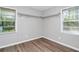 Walk-in closet provides ample storage space with built-in shelving at 3052 Sw Highbury Sw Trl, Atlanta, GA 30354