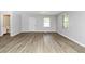 Spacious living room featuring modern floors and ample natural light at 3052 Sw Highbury Sw Trl, Atlanta, GA 30354