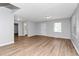 Bright living room boasts sleek floors and neutral paint, creating a calming space at 3052 Sw Highbury Sw Trl, Atlanta, GA 30354