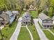 An aerial view captures a charming two-story home with well-manicured lawn at 3117 Dogwood Dr, Hapeville, GA 30354