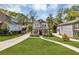 Charming two-story home featuring a welcoming front porch and well-manicured lawn at 3117 Dogwood Dr, Hapeville, GA 30354