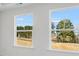 Bright room featuring two large windows offering scenic views at 93 Wilder Ridge Way, Lawrenceville, GA 30044