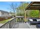 Inviting back deck with covered seating area, perfect for outdoor enjoyment, with backyard views at 1251 Pierce Se Ave, Smyrna, GA 30080