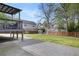 Backyard featuring deck, patio, fire pit, storage shed, and ample lawn space at 1251 Pierce Se Ave, Smyrna, GA 30080