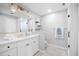 Modern bathroom featuring white cabinets and a large framed mirror at 1251 Pierce Se Ave, Smyrna, GA 30080