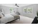 Bright bedroom with neutral tones, large windows, and minimalist decor at 1251 Pierce Se Ave, Smyrna, GA 30080