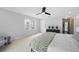 Spacious bedroom featuring neutral tones, ample natural light and modern ceiling fan at 1251 Pierce Se Ave, Smyrna, GA 30080