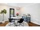 Cozy dining area features stylish lighting, decor, and access to an outdoor space at 1251 Pierce Se Ave, Smyrna, GA 30080