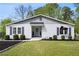 Charming single-story home with well-manicured lawn and inviting light blue front door at 1251 Pierce Se Ave, Smyrna, GA 30080