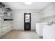 Well-organized laundry room with ample storage and a washer and dryer at 1251 Pierce Se Ave, Smyrna, GA 30080