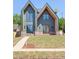 Stunning new construction with modern design elements and large windows at 504 Barrington Dr, Roswell, GA 30075
