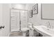 Modern bathroom features a glass shower, toilet, and sink at 524 Provence Gate Ln, Lawrenceville, GA 30044