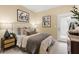 Well-decorated bedroom features modern decor and natural lighting at 524 Provence Gate Ln, Lawrenceville, GA 30044