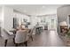 Open-concept kitchen with dining area and stainless steel appliances at 524 Provence Gate Ln, Lawrenceville, GA 30044