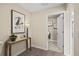 Entry hallway features a console table and opens to the laundry room at 524 Provence Gate Ln, Lawrenceville, GA 30044