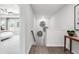 Inviting hallway showcasing a glimpse into a bright bedroom and decorative wall art at 524 Provence Gate Ln, Lawrenceville, GA 30044
