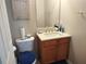 Bathroom with wooden vanity and beige countertop at 1074 Deshon Trl, Lithonia, GA 30058