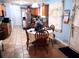 Eat-in kitchen features tiled flooring, wooden cabinets, granite countertops, and stainless steel appliances at 1074 Deshon Trl, Lithonia, GA 30058