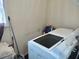 Bright laundry room featuring updated, front load washer and dryer at 1074 Deshon Trl, Lithonia, GA 30058