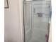 Clean and simple shower with a clear glass door, metal trim, and towel rack for added convenience at 1074 Deshon Trl, Lithonia, GA 30058