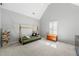 Bedroom featuring wooden bed, wood chest, carpet, and window with blinds at 2283 Edgemere Lake Cir, Marietta, GA 30062
