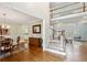 Inviting foyer with hardwood floors, staircase, and view into the living room at 2283 Edgemere Lake Cir, Marietta, GA 30062