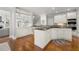 Well-equipped kitchen with granite counters, white cabinetry, and stainless steel appliances at 2283 Edgemere Lake Cir, Marietta, GA 30062