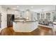 Open kitchen with granite countertops, stainless steel appliances, and breakfast nook at 2283 Edgemere Lake Cir, Marietta, GA 30062