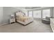 Calm main bedroom offers neutral colors and natural light at 2283 Edgemere Lake Cir, Marietta, GA 30062