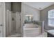 Luxurious bathroom features a separate shower and soaking tub at 29 Fern Leaf Ct, Dallas, GA 30157