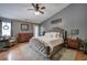 Inviting bedroom showcases stylish decor, vaulted ceiling, and hardwood floors at 29 Fern Leaf Ct, Dallas, GA 30157