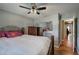 Bedroom features a comfortable bed, neutral paint and a closet with mirrored doors at 29 Fern Leaf Ct, Dallas, GA 30157