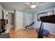 Home exercise room features wood flooring, neutral paint, and an adjacent closet at 29 Fern Leaf Ct, Dallas, GA 30157