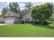 Beautifully landscaped front yard highlights this inviting home with attached garage and lovely curb appeal at 29 Fern Leaf Ct, Dallas, GA 30157
