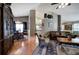 Open-concept living and dining area featuring hardwood floors, ample seating, and plenty of natural light at 29 Fern Leaf Ct, Dallas, GA 30157