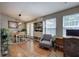 Bright home office space with natural light, hardwood floors, and neutral decor at 29 Fern Leaf Ct, Dallas, GA 30157